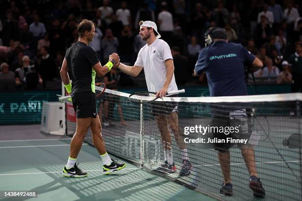 Tommy Paul of the United States is congratulated by Rafael Nadal of Spain after their second round match during Day Three of the Rolex Paris Masters...