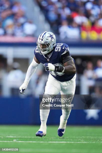 DeMarcus Lawrence of the Dallas Cowboys defends against the Chicago Bears at AT&T Stadium on October 30, 2022 in Arlington, Texas.
