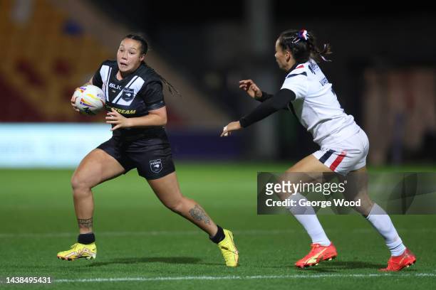 Raecene McGregor of New Zealand runs with the ball during Women's Rugby League World Cup 2021 Pool B match between New Zealand Women and France Women...