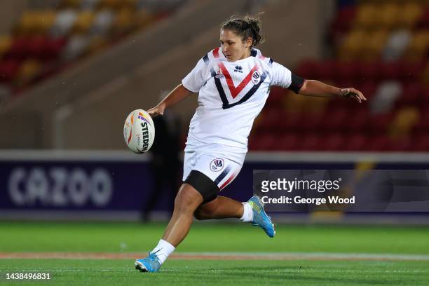 Leila Bessahli of France kicks the ball during Women's Rugby League World Cup 2021 Pool B match between New Zealand Women and France Women at LNER...