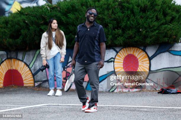 Hannibal Buress plays tennis at the Mighty Dream Forum Hosted By Pharrell Williams 2022 on November 02, 2022 in Norfolk, Virginia.