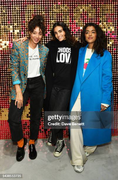 Guest, Aiysha Hart and Arooj Aftab attend the opening of the annual Choose Love shop for Help Refugees on November 02, 2022 in London, England.