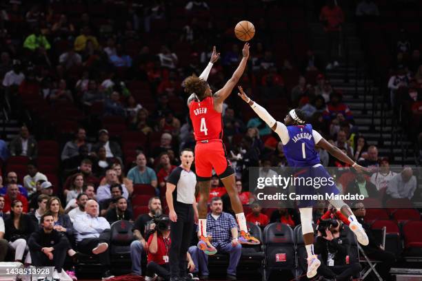 Jalen Green of the Houston Rockets puts up a shot ahead of Reggie Jackson of the LA Clippers during the first half at Toyota Center on November 02,...