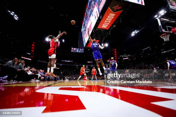 Jalen Green of the Houston Rockets puts up a shot ahead of Paul George of the LA Clippers during the second half at Toyota Center on November 02,...