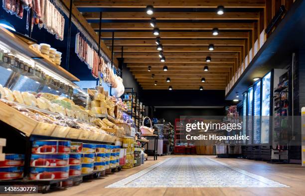 delicatessen area at a supermarket - delicatessen stock pictures, royalty-free photos & images