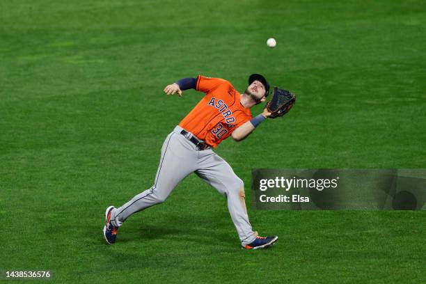 Kyle Tucker of the Houston Astros catches the ball for an out against the Philadelphia Phillies during the ninth inning in Game Four of the 2022...