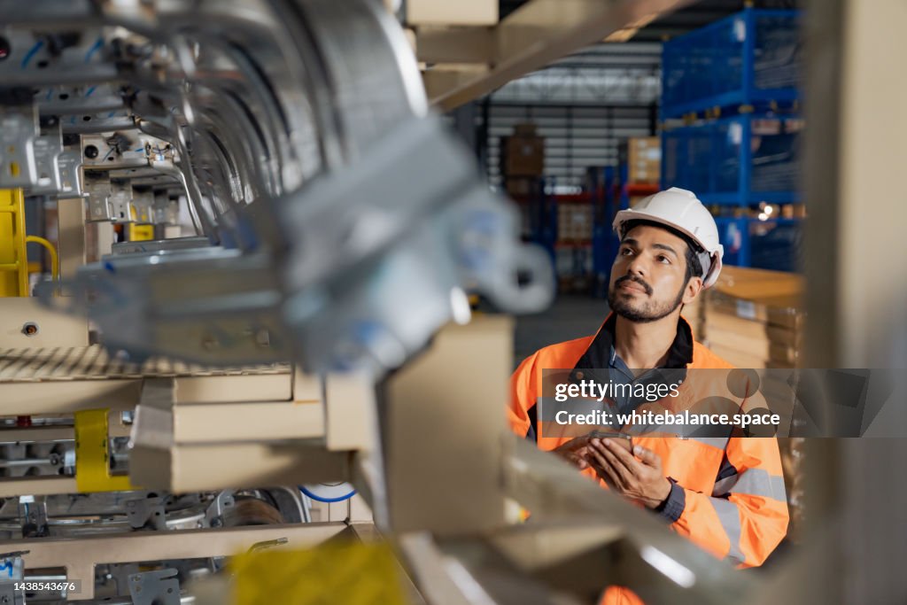 A day at work for a male and female engineers working in a metal manufacturing industry.