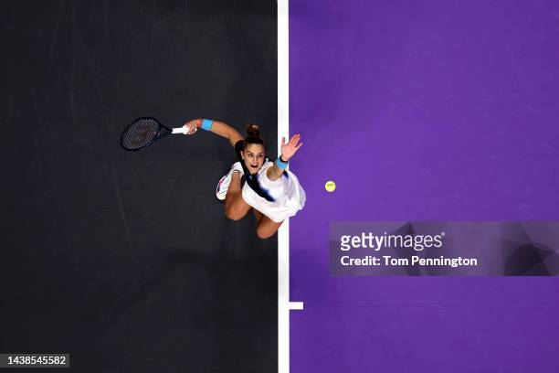 Maria Sakkari of Greece serves against Aryna Sabalenka of Belarus in their Women's Singles Group Stage match during the 2022 WTA Finals, part of the...