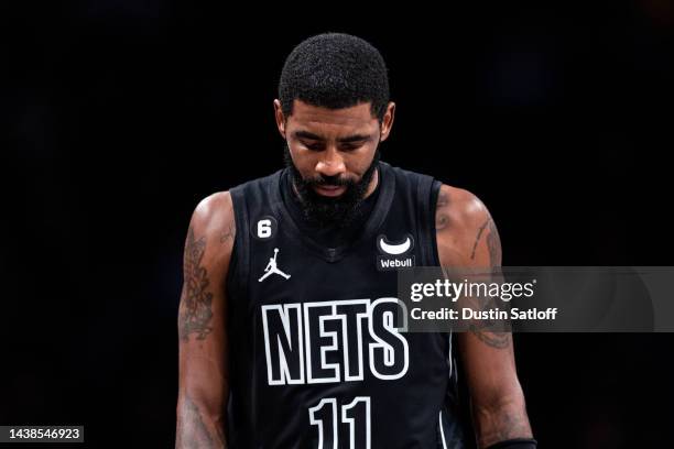 Kyrie Irving of the Brooklyn Nets walks to the bench during the second quarter of the game against the Indiana Pacers at Barclays Center on October...