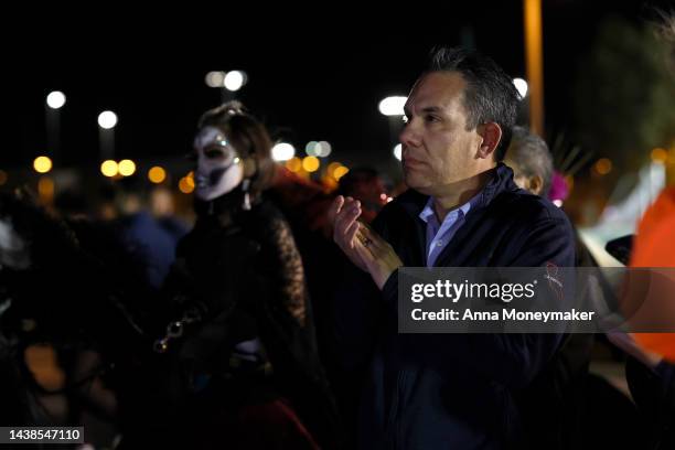 Rep. Peter Aguilar listens as Rep. Steven Horsford speaks at Día De Muertos Camino al Mictlan festival at Freedom Park on November 02, 2022 in Las...