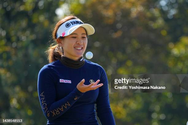 Kana Nagai of Japan juggles the ball on the 7th green during the first round of the TOTO Japan Classic at Seta Golf Course North Course on November...