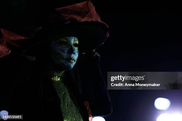 Celebrants dressed up as Catrinas, Mexico's lady of death who serves as a reminder to enjoy life and embrace mortality, compete for title of the best...