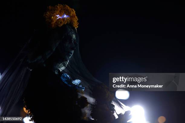 Celebrants dressed up as Catrinas, Mexico's lady of death who serves as a reminder to enjoy life and embrace mortality, compete for title of the best...