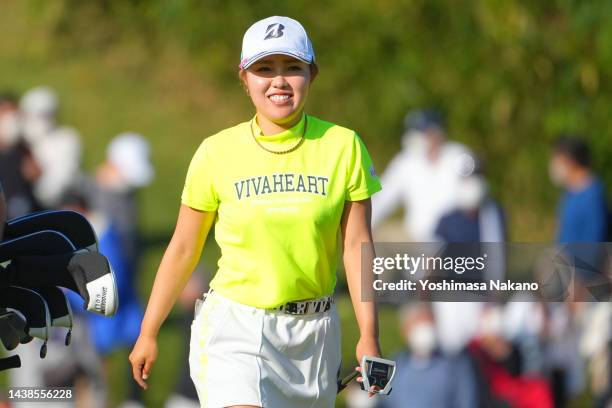 Ayaka Furue of Japan walks onto the 18th green during the first round of the TOTO Japan Classic at Seta Golf Course North Course on November 3, 2022...