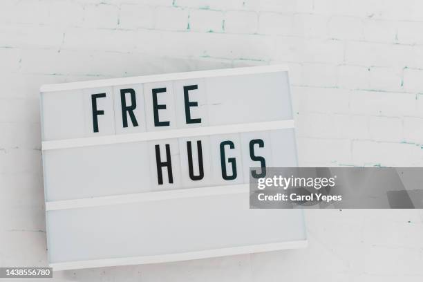 free hugs message in lightbox - kind stock pictures, royalty-free photos & images