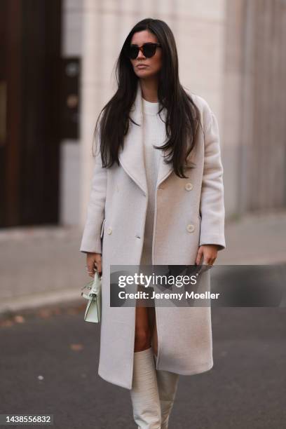 Leo Eberlin wearing Zara beige coat, H&M beige knit sweater dress, Hermes light green mini leather Kelly bag, Paris Texas beige leather boots, Celine...