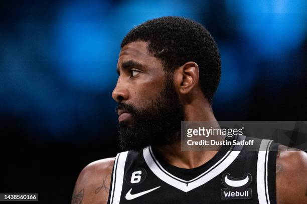 Kyrie Irving of the Brooklyn Nets looks on during a break in the action during the first quarter of the game of the Chicago Bulls at Barclays Center...