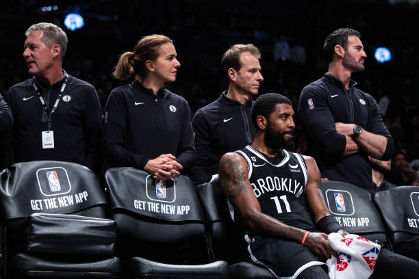 Kyrie Irving of the Brooklyn Nets looks on from the bench during the fourth quarter of the game against the Chicago Bulls at Barclays Center on...