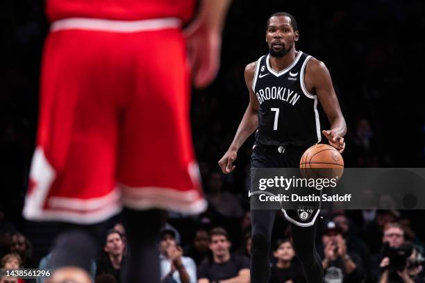 Kevin Durant of the Brooklyn Nets looks brings the ball up the court during the fourth quarter of the game against the Chicago Bulls at Barclays...
