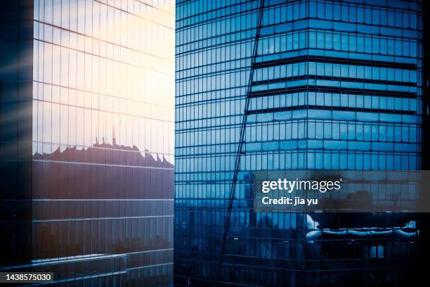 modern buildings in the city, blue glass curtain wall. wuxi, jiangsu province, china. - curtain wall facade stock pictures, royalty-free photos & images