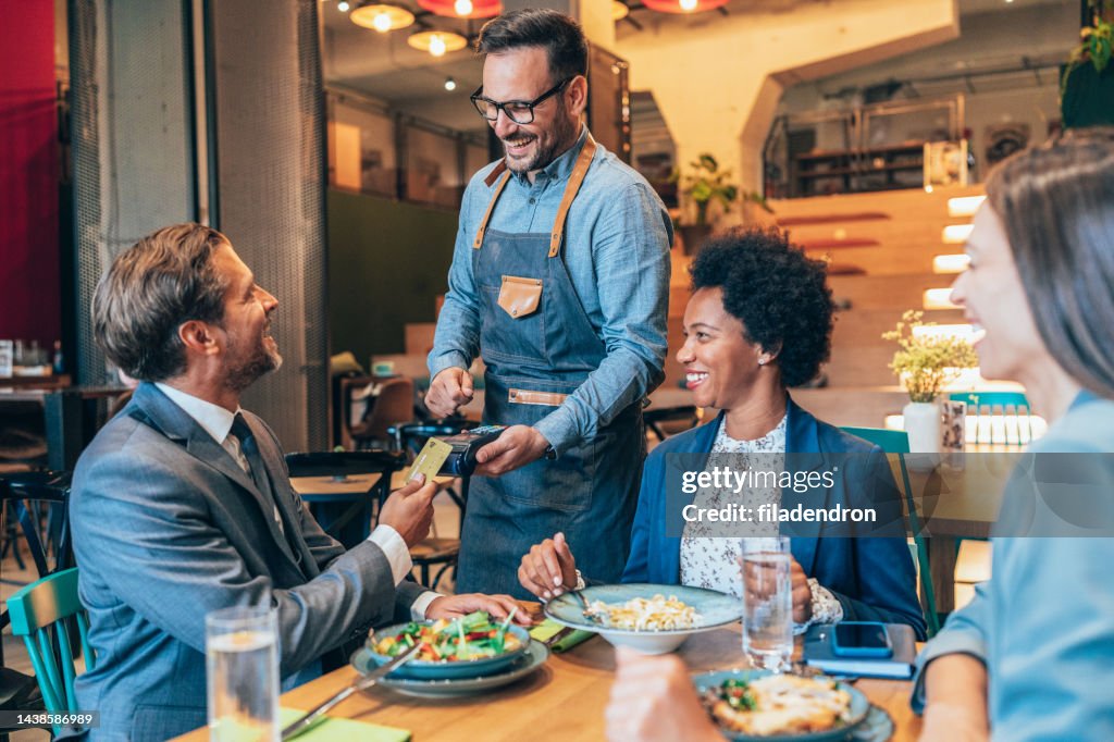 Businessman paying with credit card