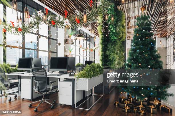 christmas celebration in office - christmas party office stockfoto's en -beelden