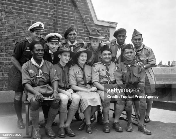 Scout leaders pose for a group portrait on the roof the Scout Headquarters on Buckingham Palace Road, while visiting Britain for the inaugural World...