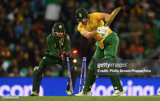 Aiden Markram of South Africa is bowled as Mohammad Rizwan looks on during the ICC Men's T20 World Cup match between Pakistan and South Africa at...