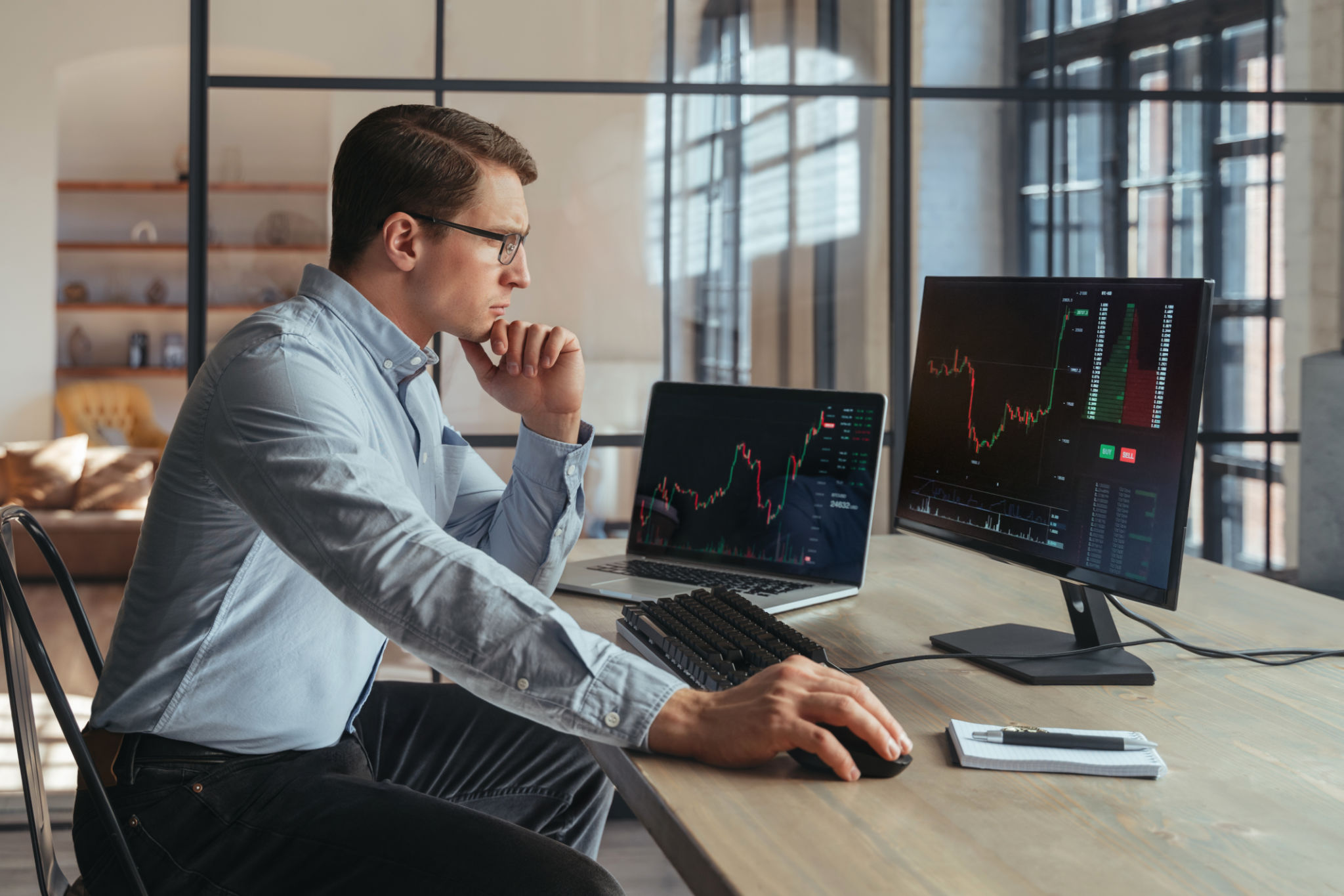 trader analyzing charts