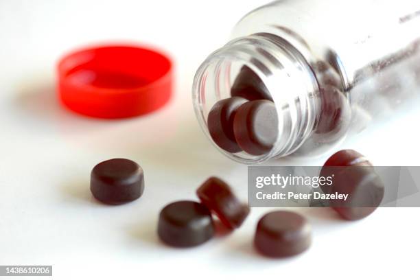 mixed berry multivitamin pills - jelly sweet stock pictures, royalty-free photos & images