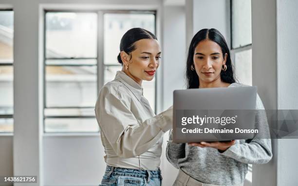 laptop, women and digital marketing employees on a blog website working on cool trendy online fashion content. branding, teamwork and social media page editors researching current trendy post ideas - branded content stock pictures, royalty-free photos & images