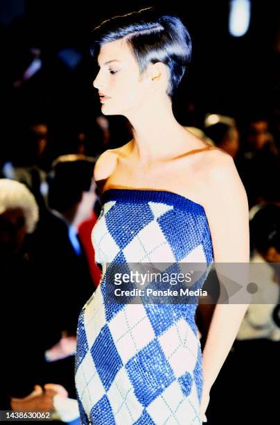 Model Linda Evangelista poses on runway wearing Perry Ellis ensemble designed by Marc Jacobs. This is Marc Jacob's first spring collection for Perry...
