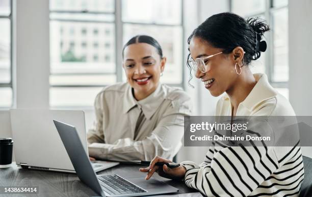 business women, laptop and and happy team in office  for web design, collaboration and training. planning, digital marketing and coaching by woman leader menor help, explain and support creative goal - boss and employee stockfoto's en -beelden