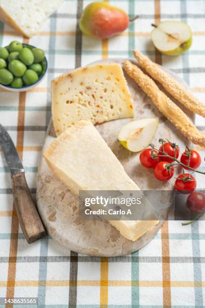 cheese platter with snacks - parmesan cheese overhead stock pictures, royalty-free photos & images