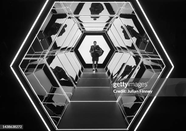 Carlos Alcaraz of Spain walks through the tunnel before entering the court to play Grigor Dimitrov of Bulgaria in the third round during Day Four of...