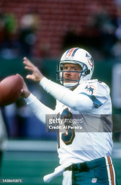 Quarterback Dan Marino of the Miami Dolphins passes the ball in the game between The Miami Dolphins vs The New York Jets at The Meadowlands on...