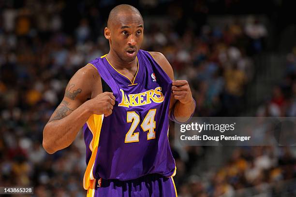 Kobe Bryant of the Los Angeles Lakers adjusts his jersey as the Lakers face the Denver Nuggets in Game Three of the Western Conference Quarterfinals...
