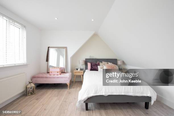 property bedroom interiors - loft stockfoto's en -beelden
