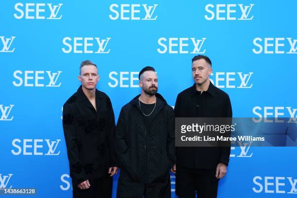 Tyrone Lindqvist, Jon George and James Hunt from Rüfüs Du Sol attends the Louis Vuitton SEE LV exhibition opening on November 03, 2022 in Sydney,...