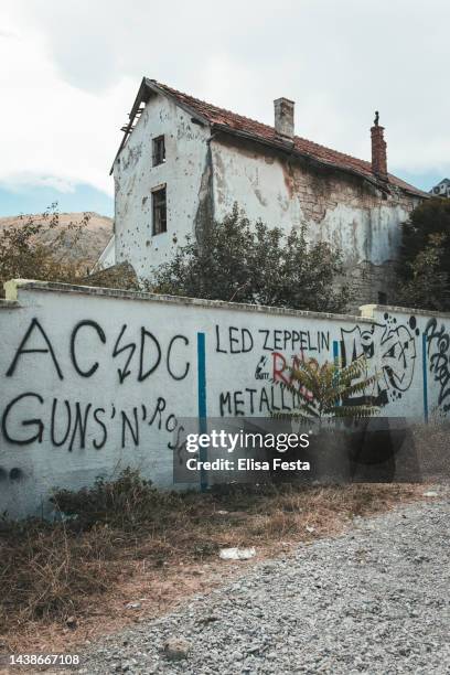 a house destroyed by the war in mostar - bosnia and herzegovina - genocide stock pictures, royalty-free photos & images
