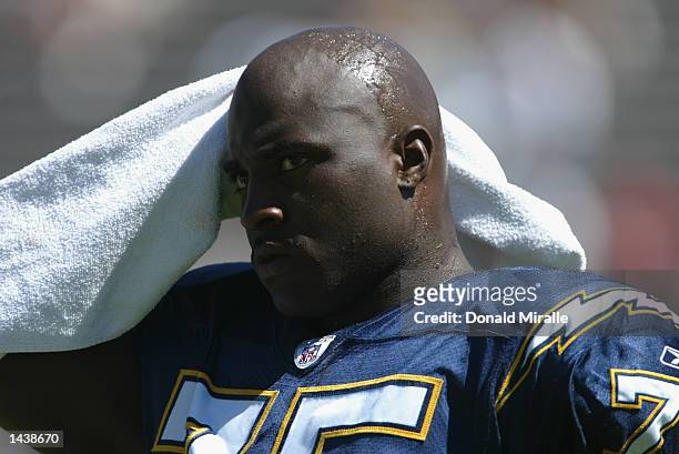 Defensive end Marcellus Wiley of the San Diego Chargers wipes the sweat from his head during the game against the Arizona Cardinals on September 22,...