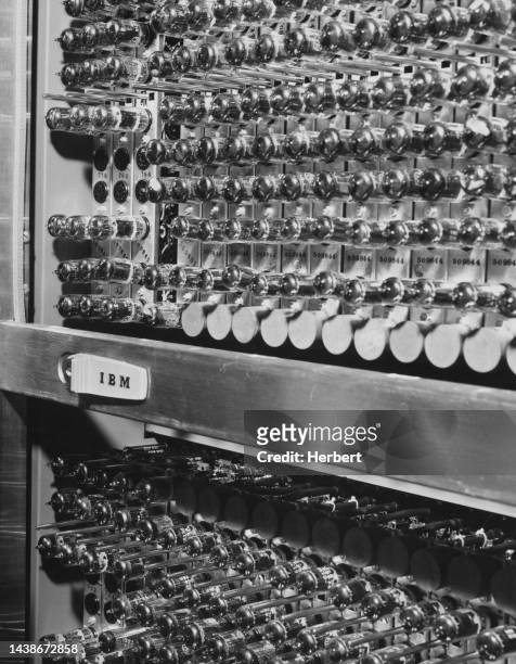 Computer components with 4 core memory units showing banks of tubes, United States, circa 1955. Launched by the company in 1954, the IBM 704 is a...