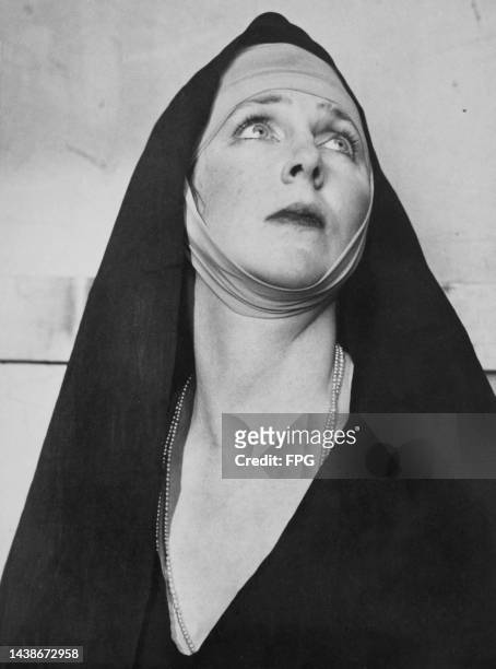 British aristocrat, socialite and actress Lady Diana Manners in costume as the Madonna in the stage production of Karl Vollmolle's wordless play 'The...