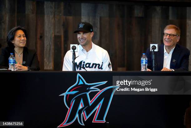 General manager Kim Ng, manager Skip Schumaker, and owner Bruce Sherman of the Miami Marlins speak to the media during a press conference at...