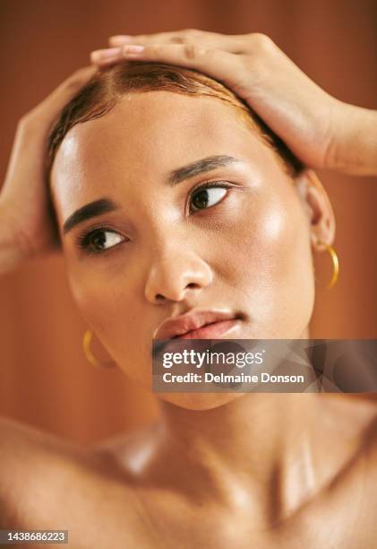 face, skincare and black woman thinking of makeup, wellness and beauty against a brown studio background. young african model with an idea for natural cosmetics, facial health and care for body - beauty cosmetic luxury studio background stock pictures, royalty-free photos & images