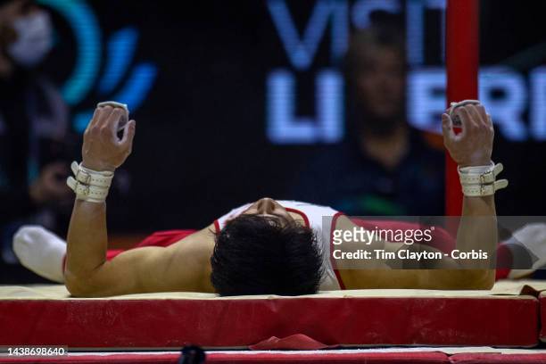 November 2: Daiki Hashimoto of Japan after falling while performing his routine on the horizontal bar apparatus during the Men's Team Final at the...