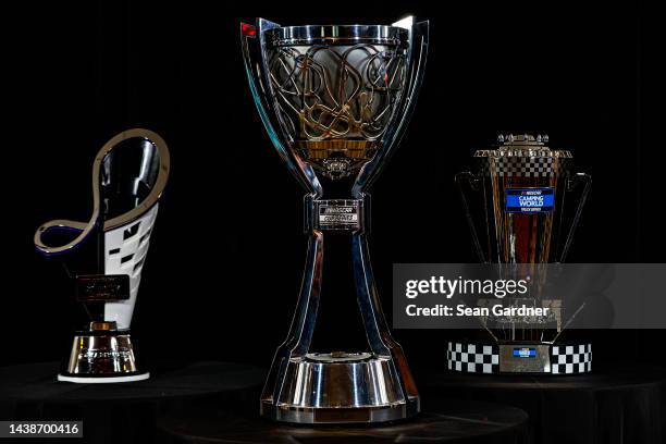 Detail view of the 2022 NASCAR Xfinity Series Championship trophy, the Bill France NASCAR Cup Series Championship trophy and NASCAR Camping World...