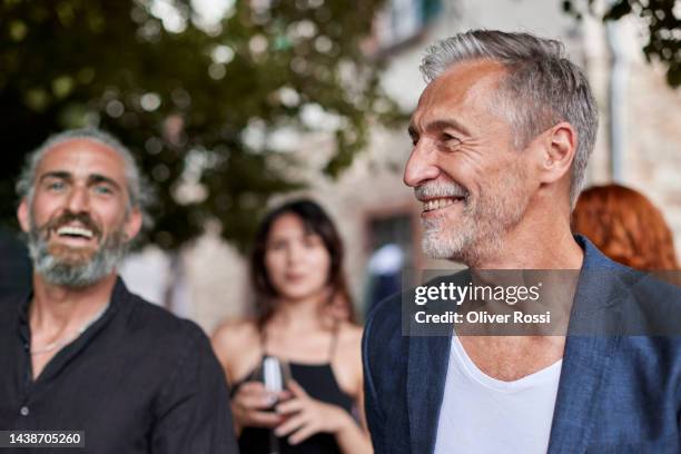 happy senior man on an outdoor celebration - senior woman portrait stock-fotos und bilder