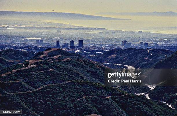 Helicopter photograph of the Interstate 405 Freeway as it goes through the Sepulveda Pass looking south towards Los Angeles and the Pacific Ocean and...