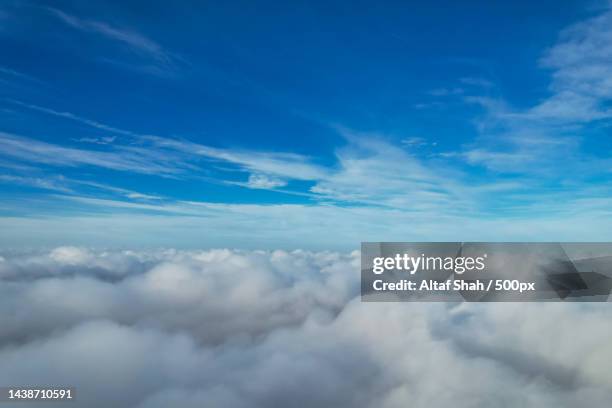 low angle view of clouds in sky,united kingdom,uk - low flying aircraft bildbanksfoton och bilder